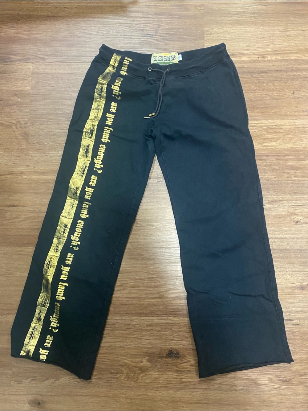 L.A.M.B by Gwen Stefani black and gold sweatpants